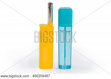 Household Piezo-electric Gas Lighter For Ignite A Gas Stove Burner And Gas Lighter Refill On A White