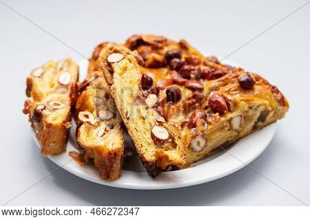 Typical Portuguese Fruit Cake Bolo Rainha On White Plate