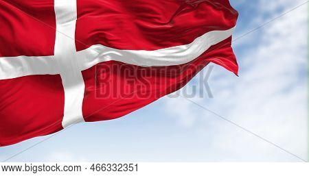 Close-up View Of The Denmark National Flag Waving In The Wind. The Kingdom Of Denmark Is A Nordic Co