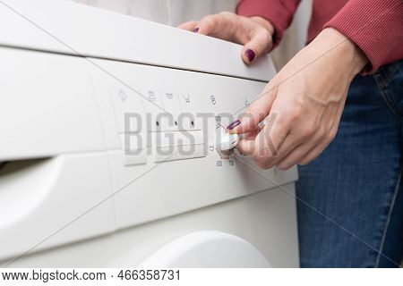 A Person Chooses A Washing Mode With A Switch. Washing Mode. Temperature Mode. Washing Machine.