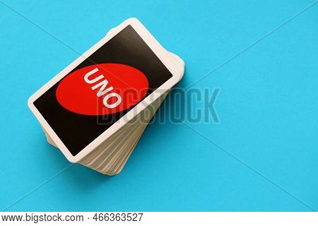 Ternopil, Ukraine - May 15, 2022: Many Colorful Uno Game Cards On Blue Background Close Up. Uno Is A