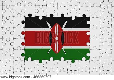 Kenya Flag In Frame Of White Puzzle Pieces With Missing Central Parts