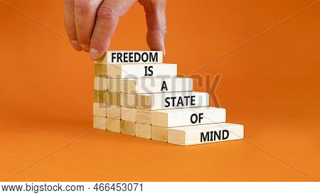 Freedom In Mind Symbol. Concept Words Freedom Is A State Of Mind On Wooden Blocks On A Beautiful Ora