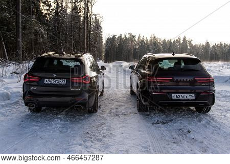 Moscow, Russia - February 05, 2022 Bmw X3 (g01) And Genesis Gv70 (jk1). Modern Suv In Nature Backgro