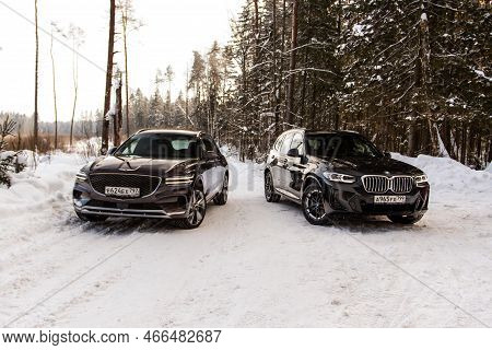 Moscow, Russia - February 05, 2022 Genesis Gv70 (jk1) And Bmw X3 (g01), Subcompact Luxury Suv Car On