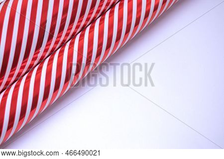 Guft Wrapping Paper With Red And White Stripes On White Background With Copy Space For Present Packi