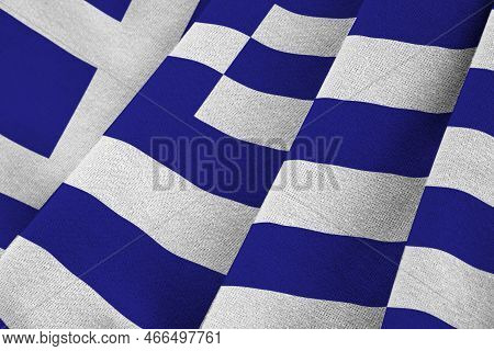 Greece Flag With Big Folds Waving Close Up Under The Studio Light Indoors. The Official Symbols And 