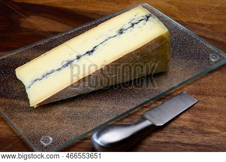 French Semi-soft Cow Milk Cheese Morbier From Franche-comte Region With Thin Black Layer And Strong