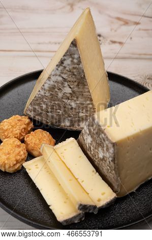 Pieces Of Cheese Tomme De Montagne Or Tomme De Savoie Made From Cow Milk In French Alps