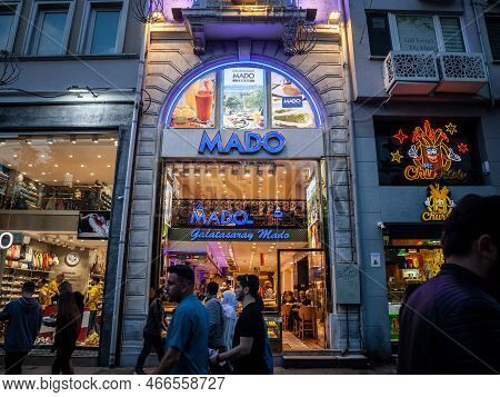 Istanbul, Turkey - May 21, 2022: Selective Blur On A Mado Logo On Their Cafe In Taksim, Istanbul. Ma
