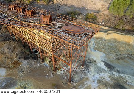Drone Aerial Of Abandoned Copper Mine And Demolished Steel Platform. Environmental Pollution Land Co