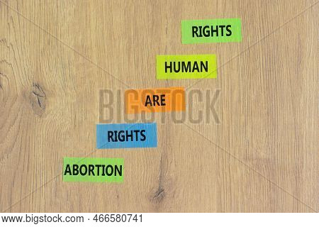 Abortion Rights Symbol. Concept Words Abortion Rights Are Human Rights On Colored Paper. Beautiful W