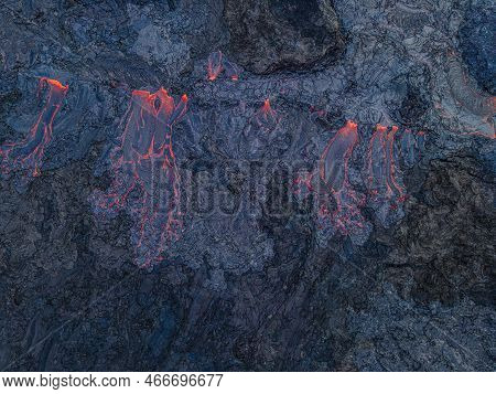 View Of An Active Lava Flow From Above. Red Hot Magma Flows From A Volcano On The Reykjanes Peninsul