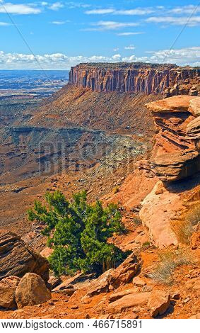 Sandstone Ridge Jutting Out Of A Canyon In Canyonlands National Park In Utah