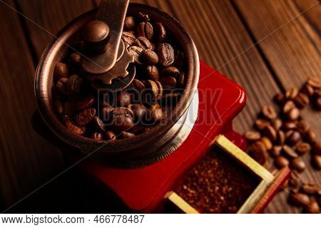 A Coffee Grinder And Coffee Background A