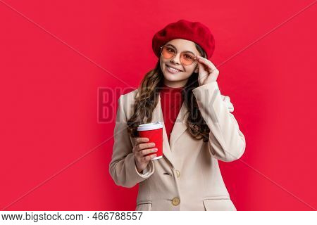 Stylish Teen Girl Holding Coffee In Studio. Young Stylish Teen Girl. Photo Of Stylish Teen Girl
