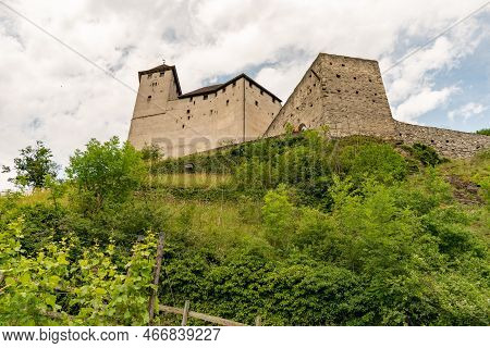 Balzers, Liechtenstein, June 5, 2022 Historic Old Gutenberg Castle On A Cloudy Day