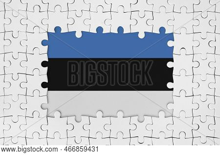 Estonia Flag In Frame Of White Puzzle Pieces With Missing Central Parts