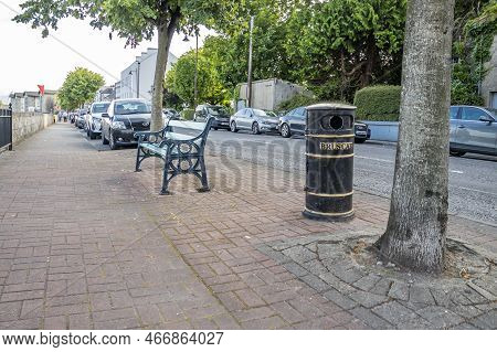 Ballina, County Mayo, Ireland - August 01 2022 : Bin And Bench Standing In Ballina Town.