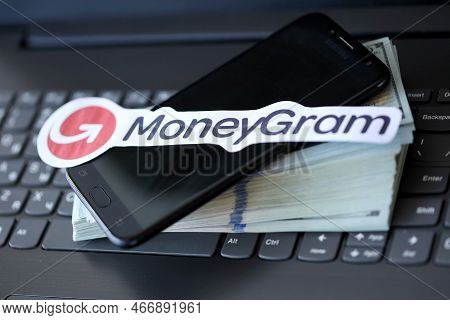 Ternopil, Ukraine - September 6, 2022 Moneygram Paper Logotype Lies On Black Laptop Keyboard With Us