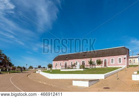 Elim, South Africa - Sep 21, 2022: A Street Scene, With The E-centre In An Historic Building, In Eli