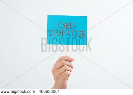 Sign Displaying Cyber Defamation. Business Idea Slander Conducted Via Digital Media Usually By Inter