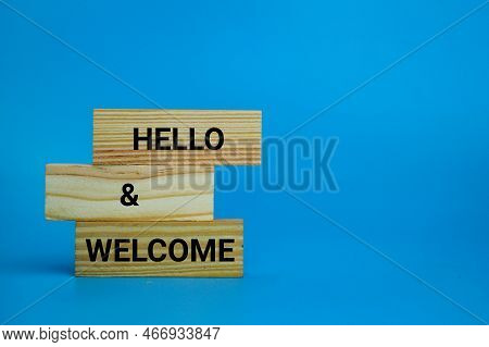 Wooden Board With The Words Hello And Welcome. Hello And Welcome Symbol. Business Hello And Welcome 