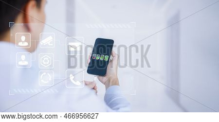 Reducing Application Usage To Save Battery Power, White Usb Cable Connected With Smartphone Charging