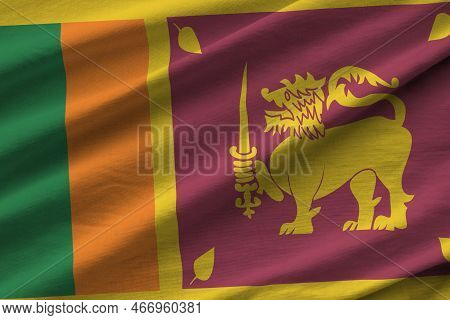 Sri Lanka Flag With Big Folds Waving Close Up Under The Studio Light Indoors. The Official Symbols A