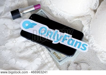 Ternopil, Ukraine - September 6, 2022 Onlyfans Paper Logotype Among Lipstick, Earrings And Women Lin