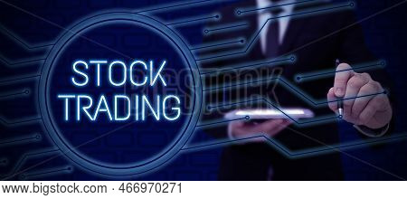 Sign Displaying Stock Trading. Internet Concept Buy And Sell Of Securities Electronically On The Exc