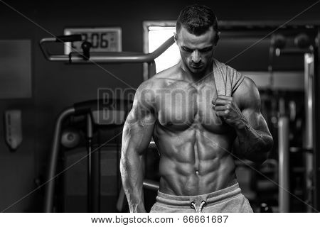 Portrait Of A Physically Fit Young Man In A Healthy Club