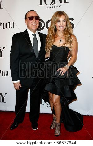 NEW YORK-JUNE 8: Music executive Tommy Mottola (L) and wife Thalia attend American Theatre Wing's 68th Annual Tony Awards at Radio City Music Hall on June 8, 2014 in New York City.