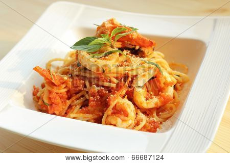Spaghetti  seafood with tomato concasse