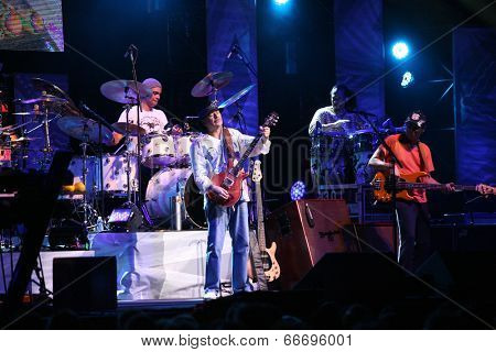 ATLANTIC CITY, NJ - JUNE 13: Musician Carlos Santana performs with his band at The Borgata Hotel & Casino on June 13, 2014 in Atlantic City, NJ. 