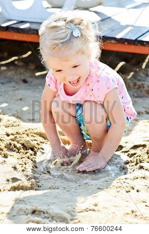 Toddler Girl And Puddle