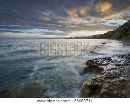 rocky Adriatic coast, in the light of the rising sun
