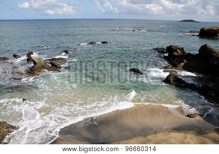 Foamy Wave On White Sand Beach
