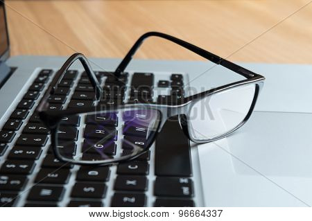 Glasses on a Keyboard