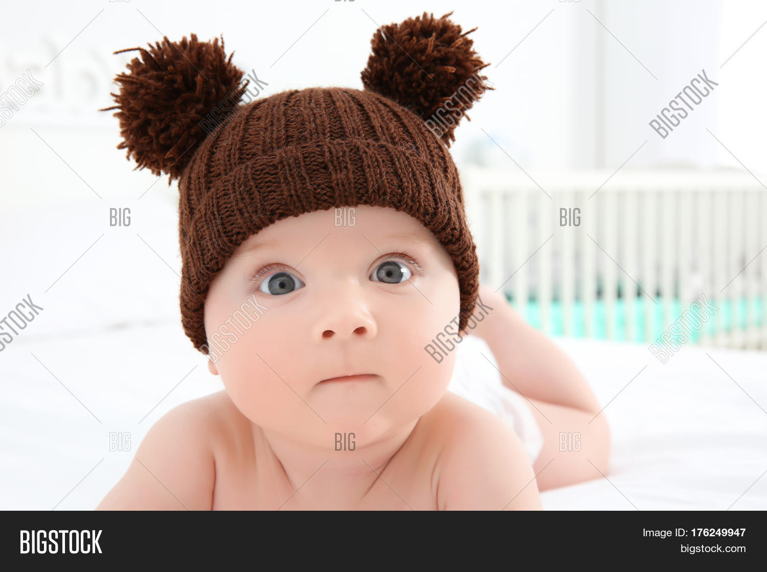 baby wearing cap