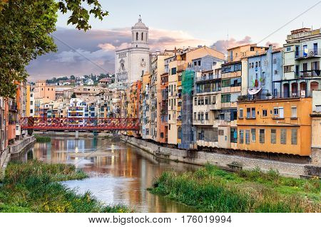 historical jewish quarter in Girona with Eiffel Bridge at sunrise, Barcelona, Spain, Catalonia