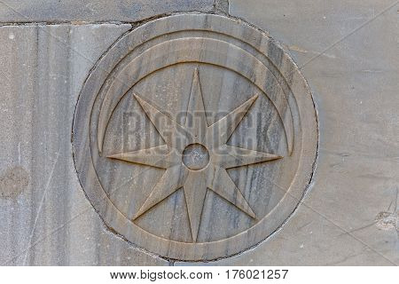 Relief of the moon and the star with eight angles, detail on the wall of the Dome of the Rock an Islamic shrine located on the Temple Mount in the Old City Jerusalem, Israel.