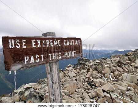Sign Extreme Caution on Frosty Mountain in Manning Park. Hope. Vancouver. British Columbia. Canada.