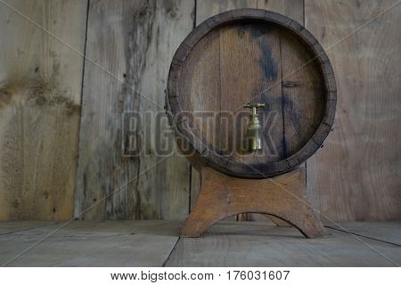 background of barrel and worn old table of wood