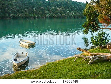 Two little boats on the Gonubie river South Afrcia at sunset