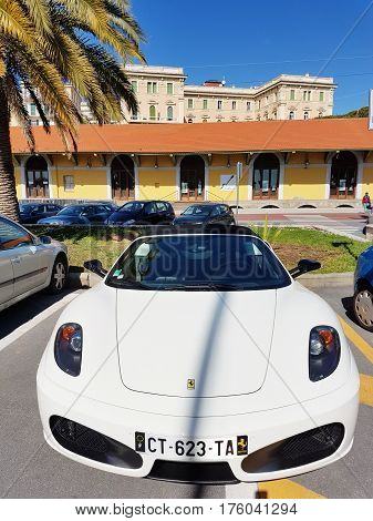 San Remo Italy - March 5 2017: White Ferrari F430 Spider F430 Parked in The Street Of San Remo
