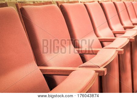 Selective focus of Empty rows of armchairs in hall