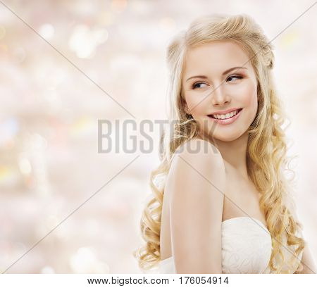 Fashion Model Long Blond Hair Woman Beauty Portrait Happy Young Girl Smiling looking over shoulder