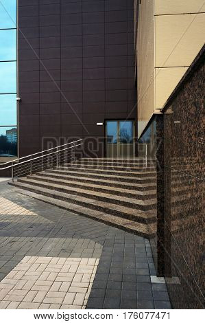 Stairs to entrance in modern building.          