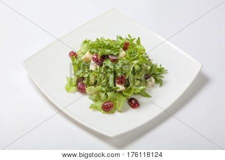 Fresh Salad Of Lettuce With Sweet Sauce With Pieces Of Fruit